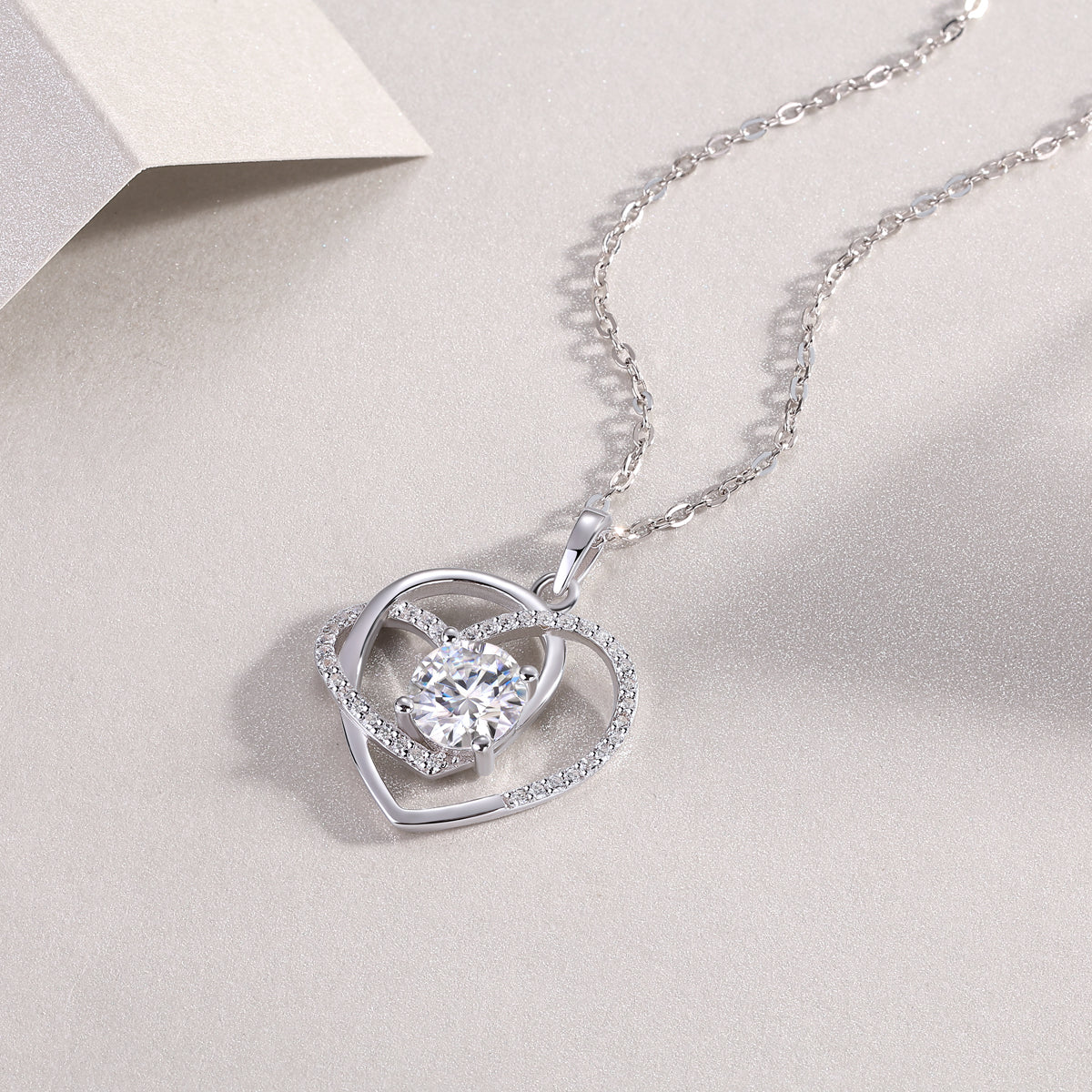 Heart To Heart Interlocking — Signature Sterling Silver Pendant Necklace (Luxury Moissanite)